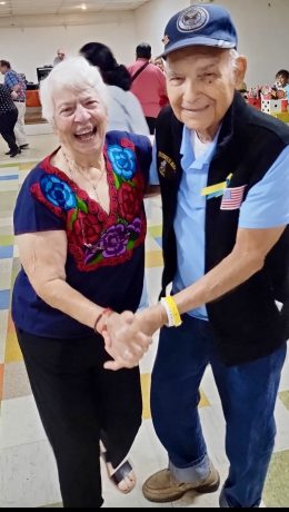 Dolores and Tex are all smiles during an Older Adults Program birthday bash.